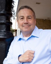 ActionCOACH Luc Beriault smiling outside