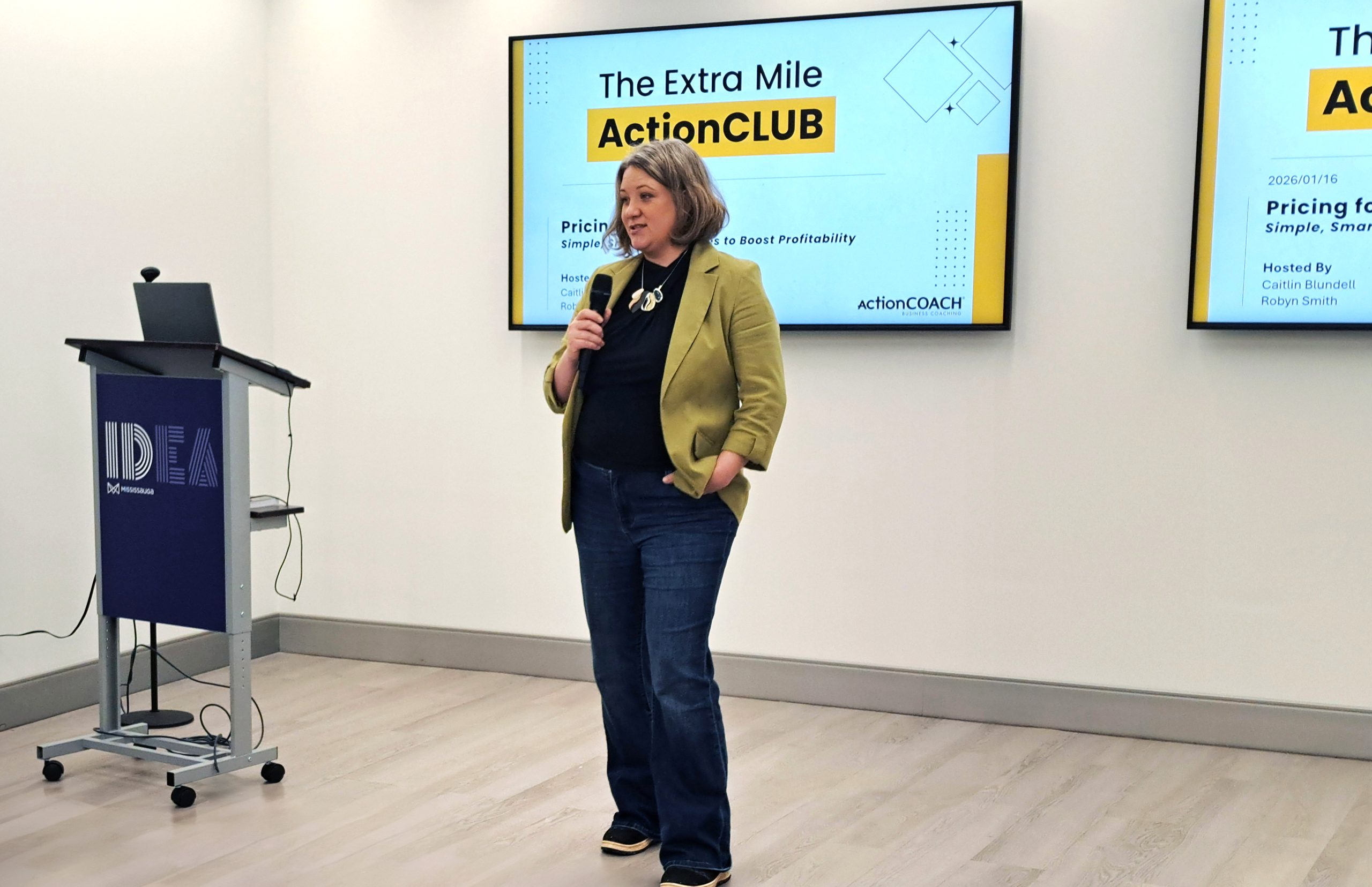 Caitlin Blundell speaking to business owners at ActionCLUB